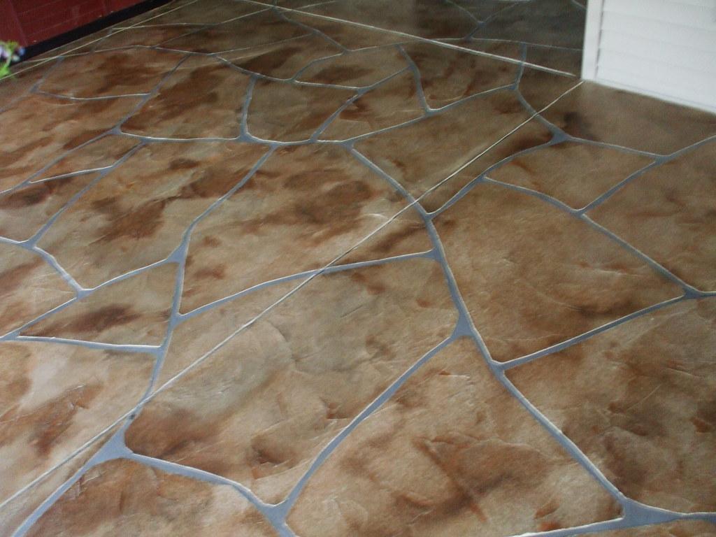 Finished grand flagstone stamped concrete on a residential patio
